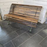 Old cast iron garden bench with oak slats