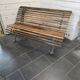 Old cast iron garden bench with oak slats