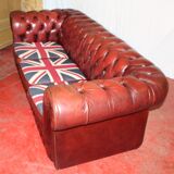 Red 3 x seater chesterfiel with Union Jack cushions