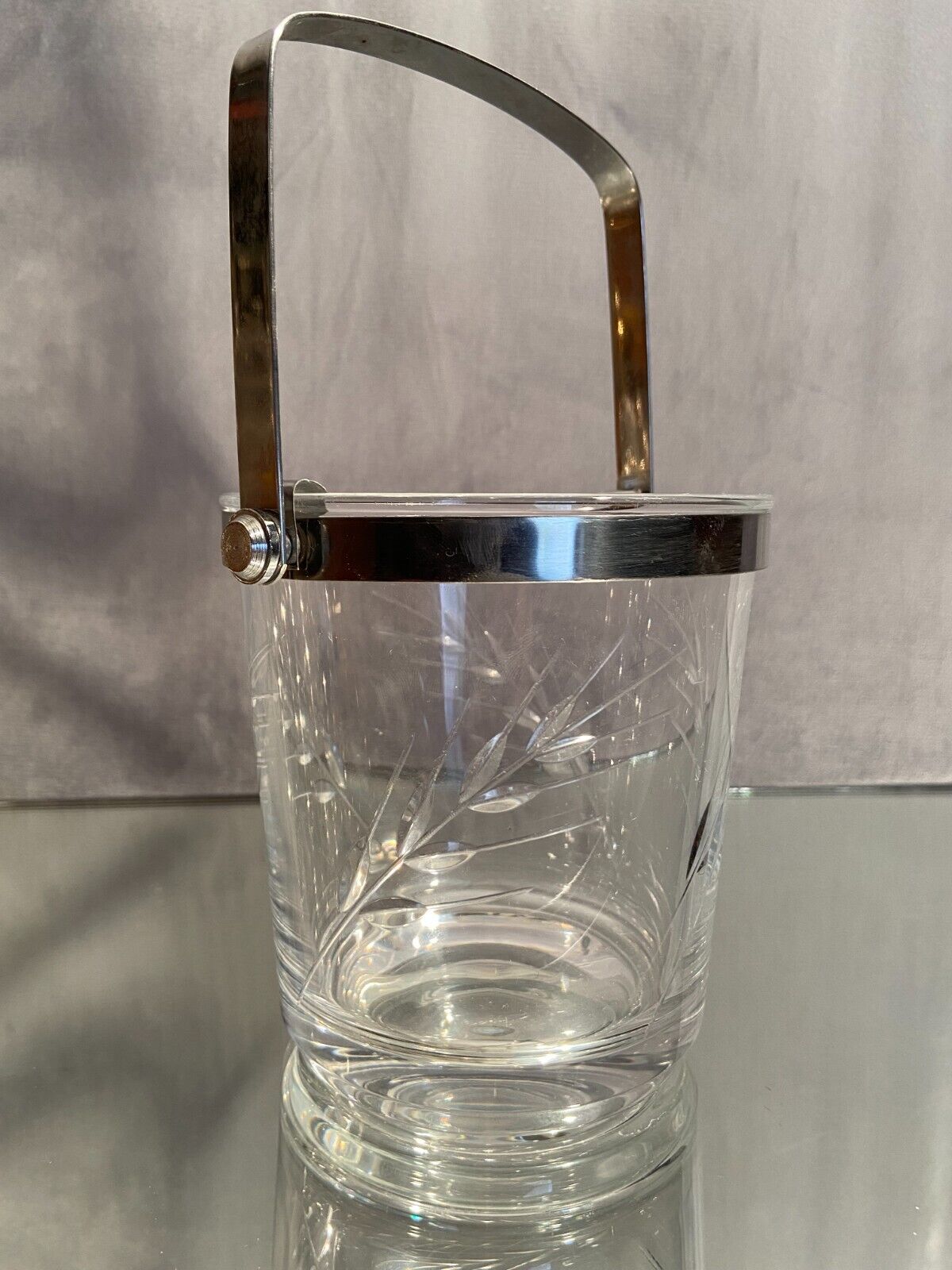 Cut crystal ice bucket with plant decoration and stainless steel frame