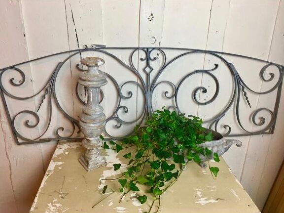 Old cast iron pediment door grille