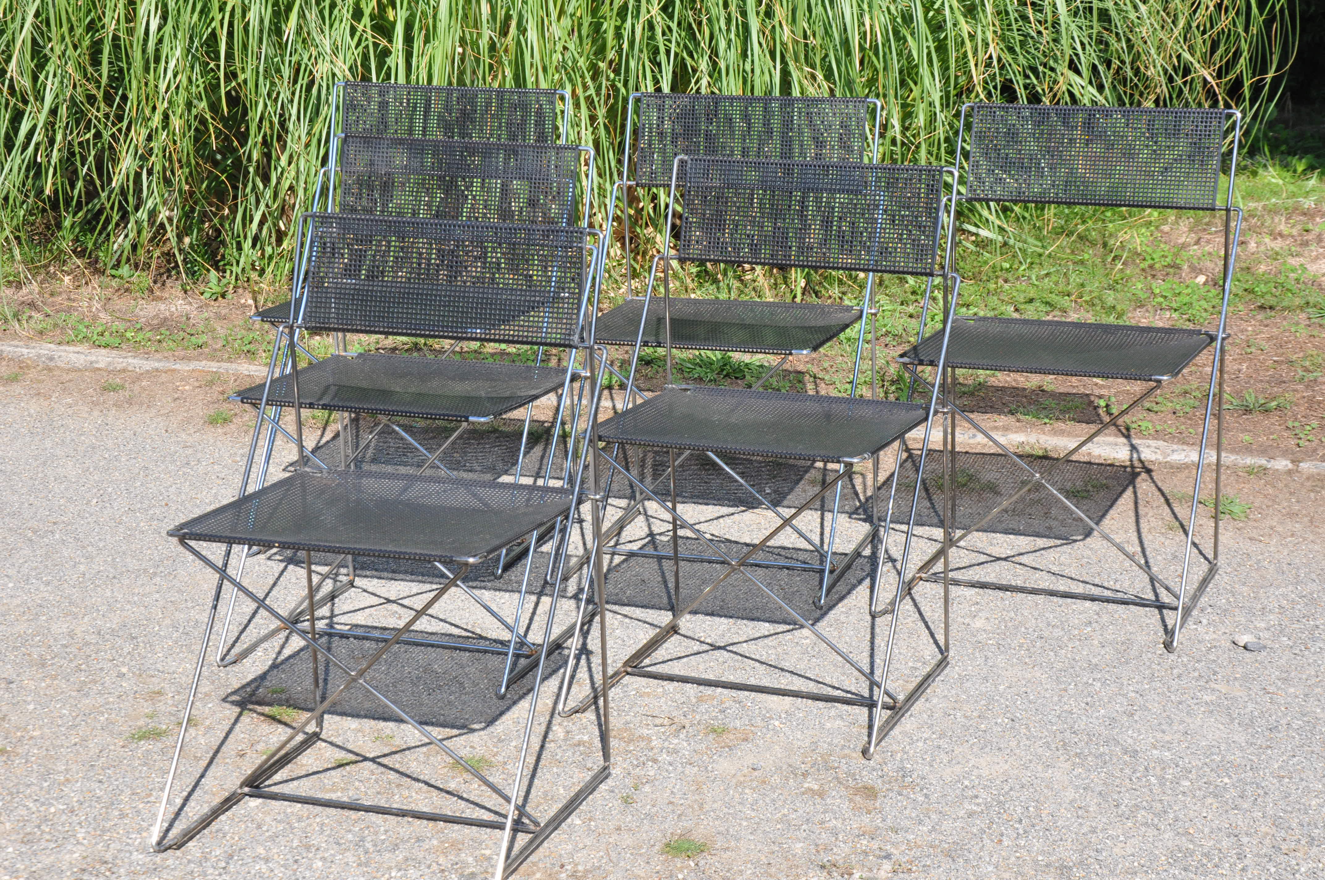 Nuova x line omli chairs by Niels Jørgen Haugesen