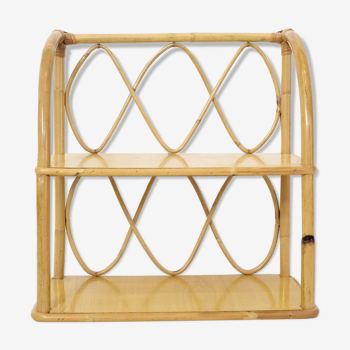 Rattan wall shelf from the 60s and 70s.