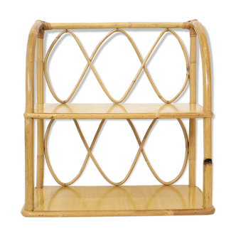 Rattan wall shelf from the 60s and 70s.