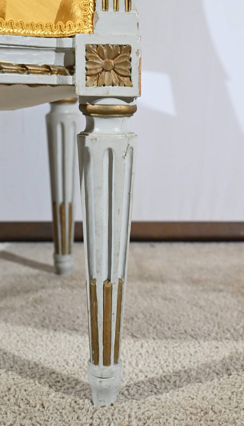 Pair of Cabriolet Armchairs, in rechampi wood, Louis XVI style – Late 19th century