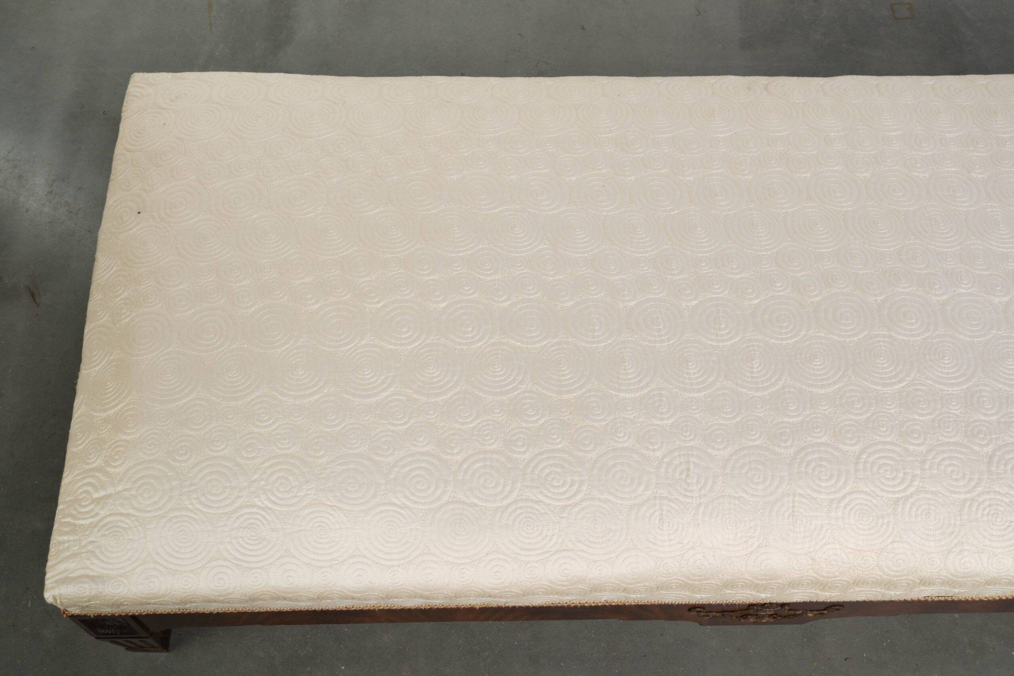 Antique French sofa from the 19th century in Empire style with a silk seat