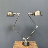 Unique double two-arm polished Jielde table lamp