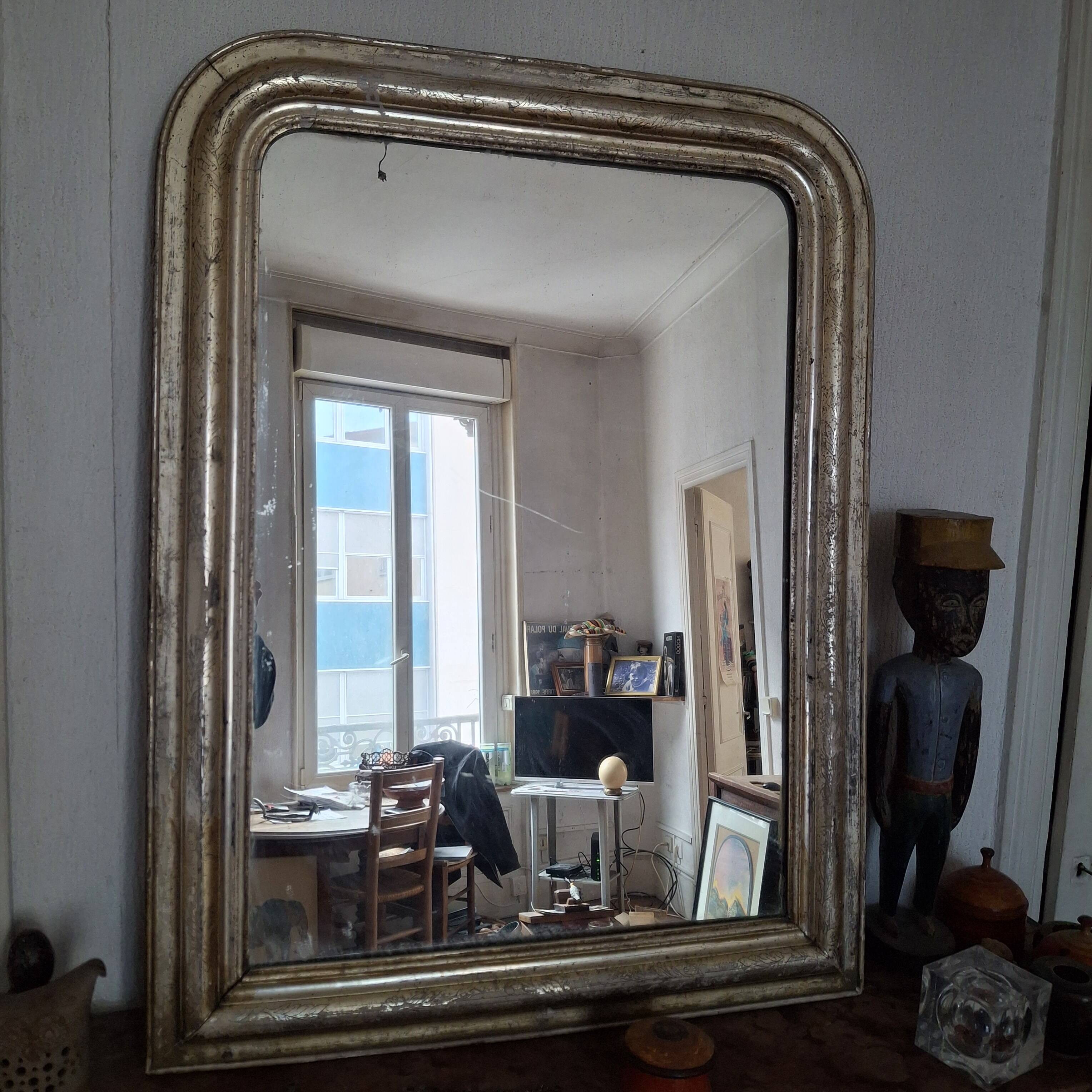Antique Louis Philippe silvered mirror.