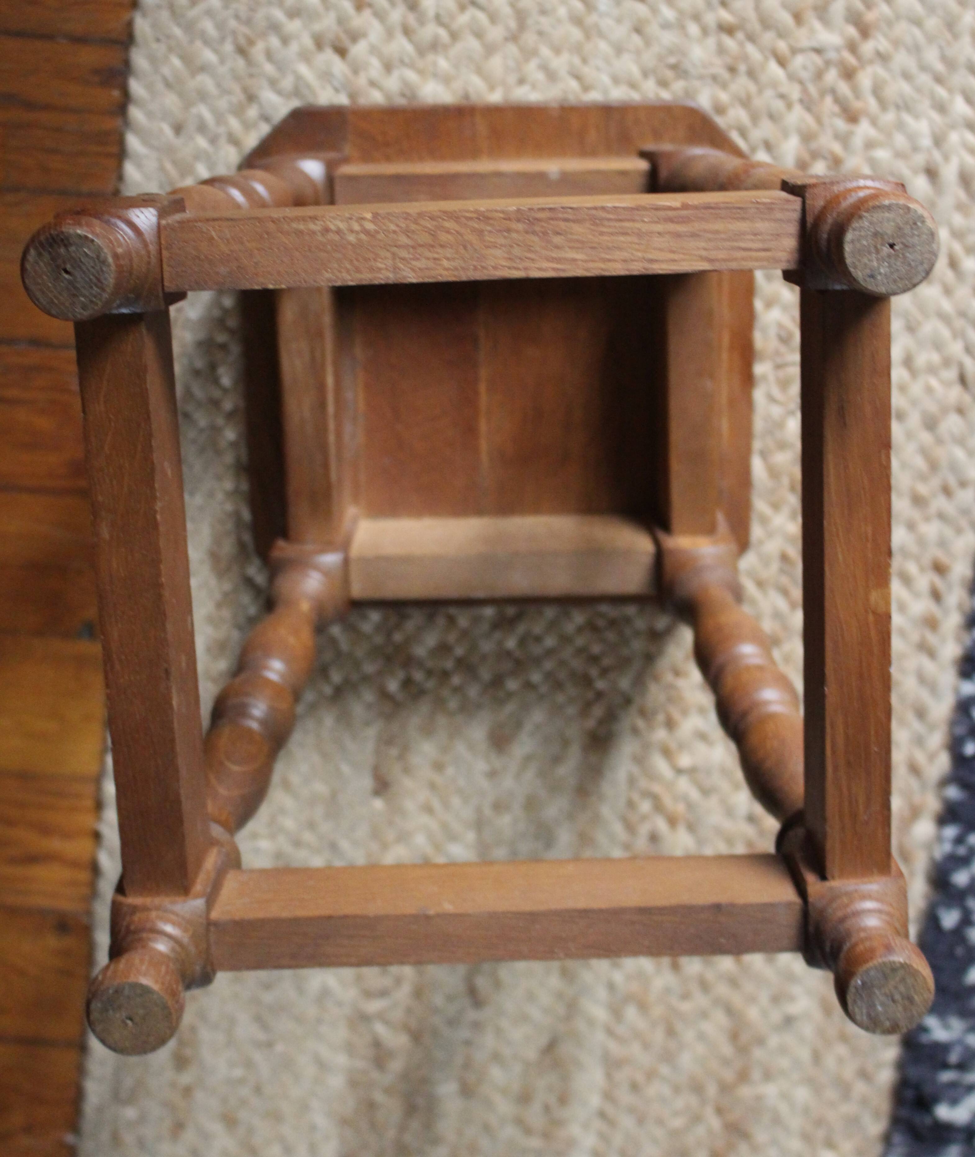 Wooden stool with a square seat