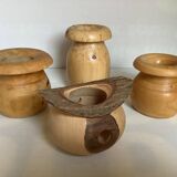 Four solid turned wooden vases