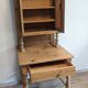 Former campaign secretary's desk in solid pine with a high cupboard.