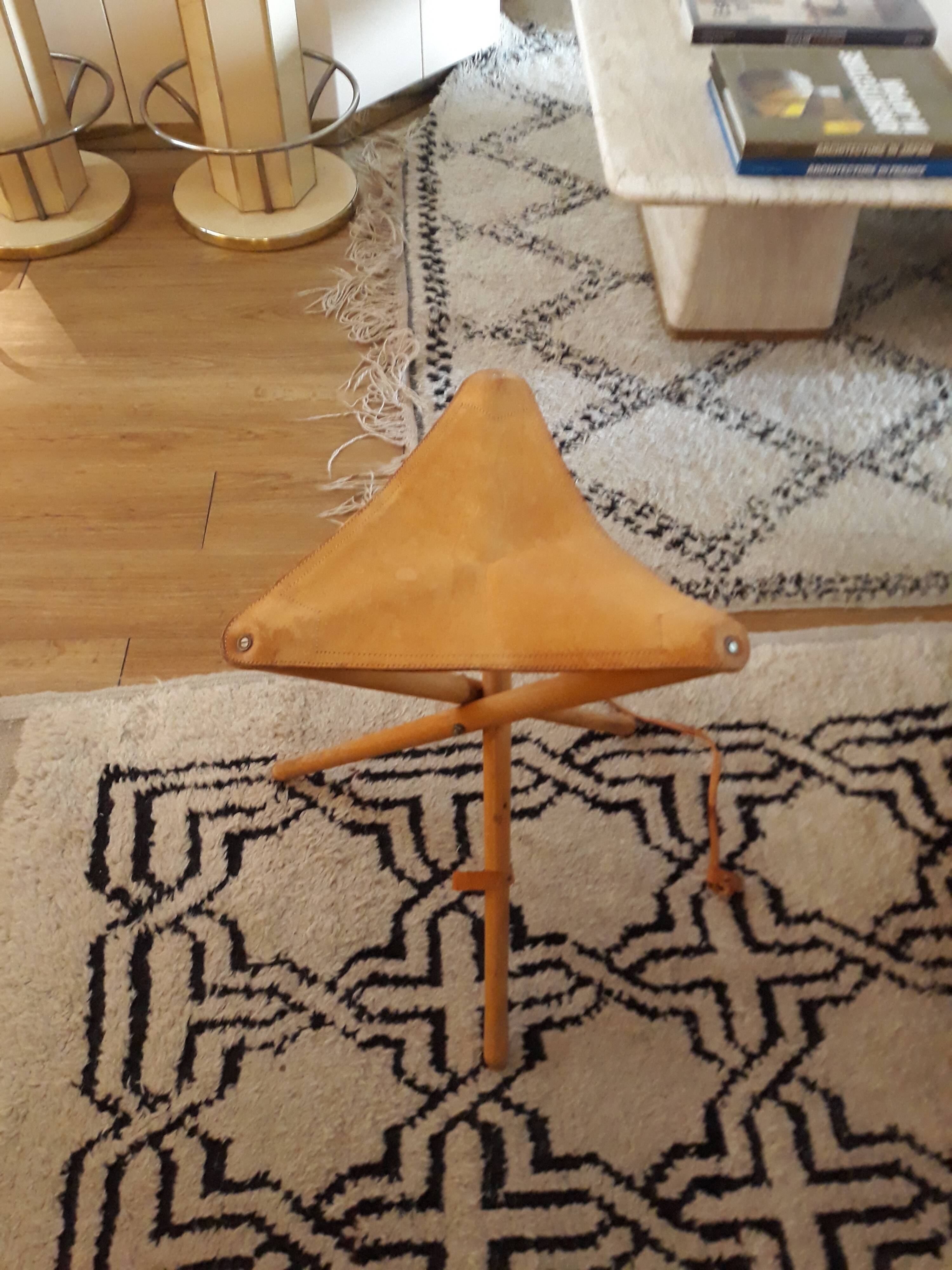 Wooden stool and vintage foldable leather