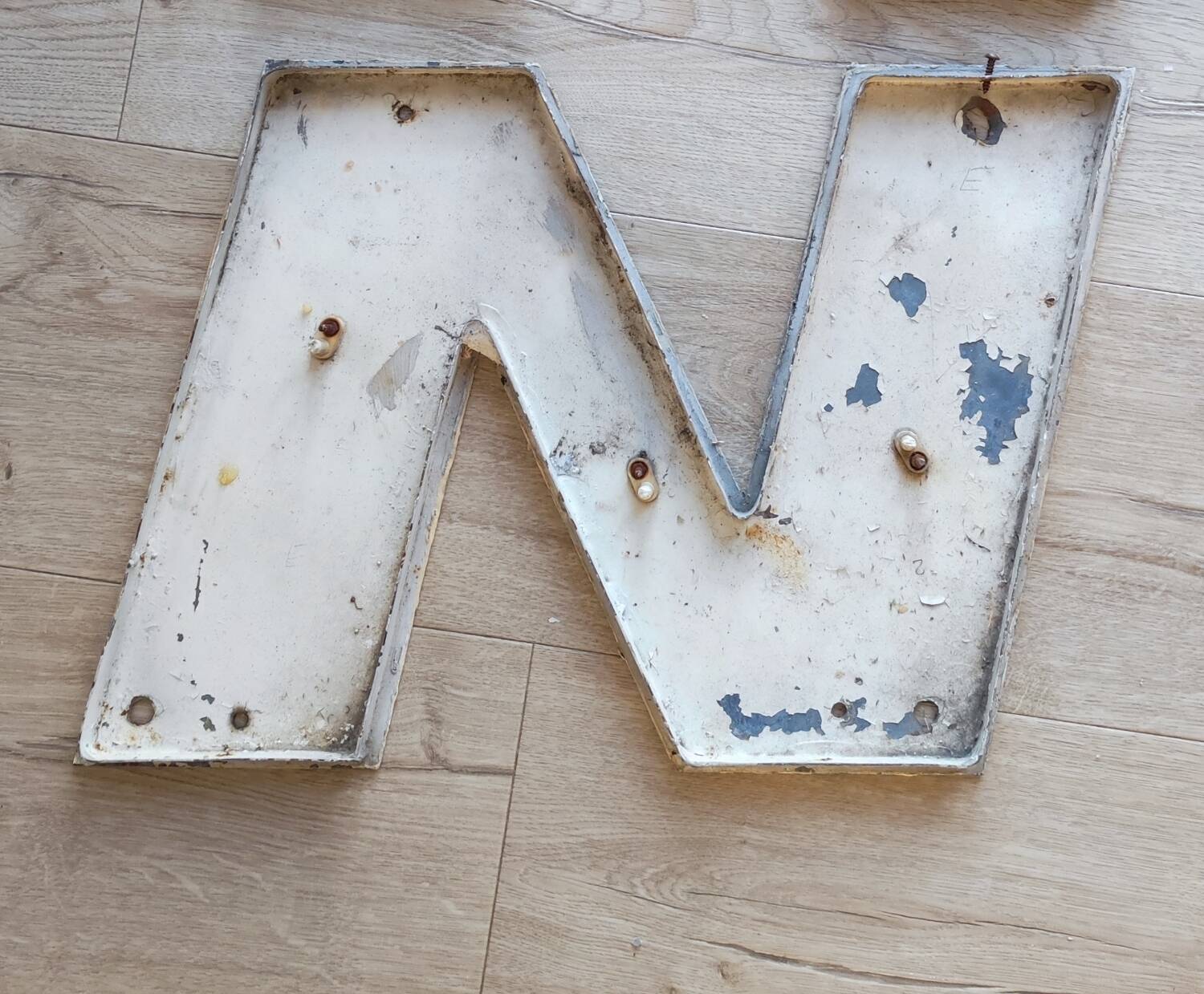 Old metal sign letter