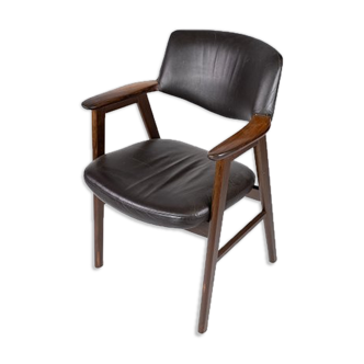 Armchair in rosewood and black leather of danish design from 1976.