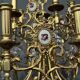 Chandelier with ceramic medallions and Swarovski crystals with 15 light points