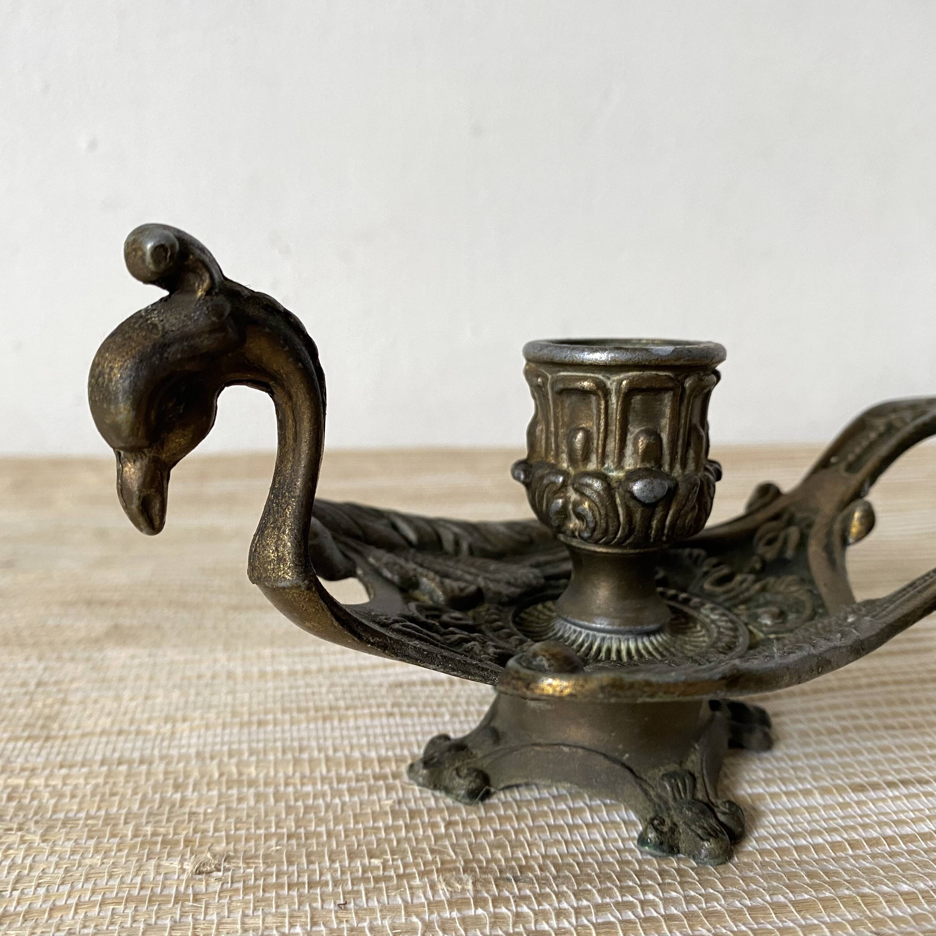 Brass bird candle holder