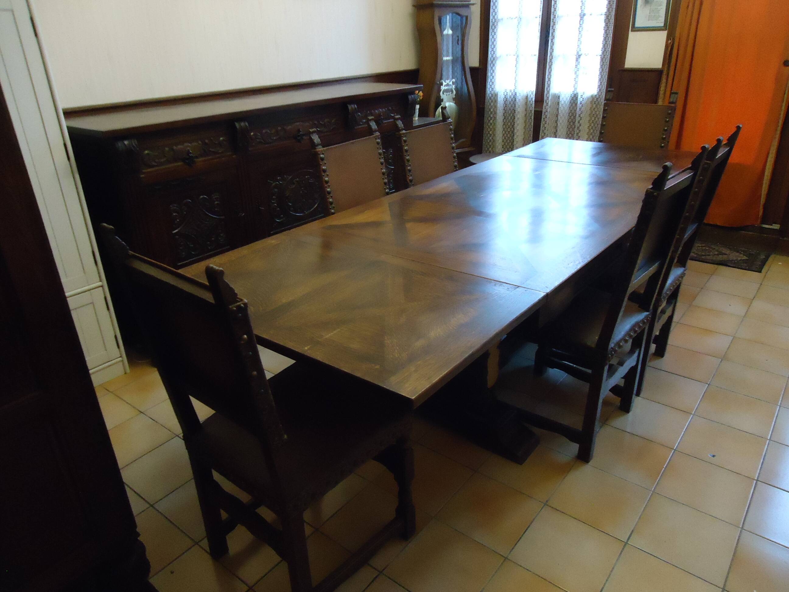 Dining table and 6 solid wood chairs from the 1950s.