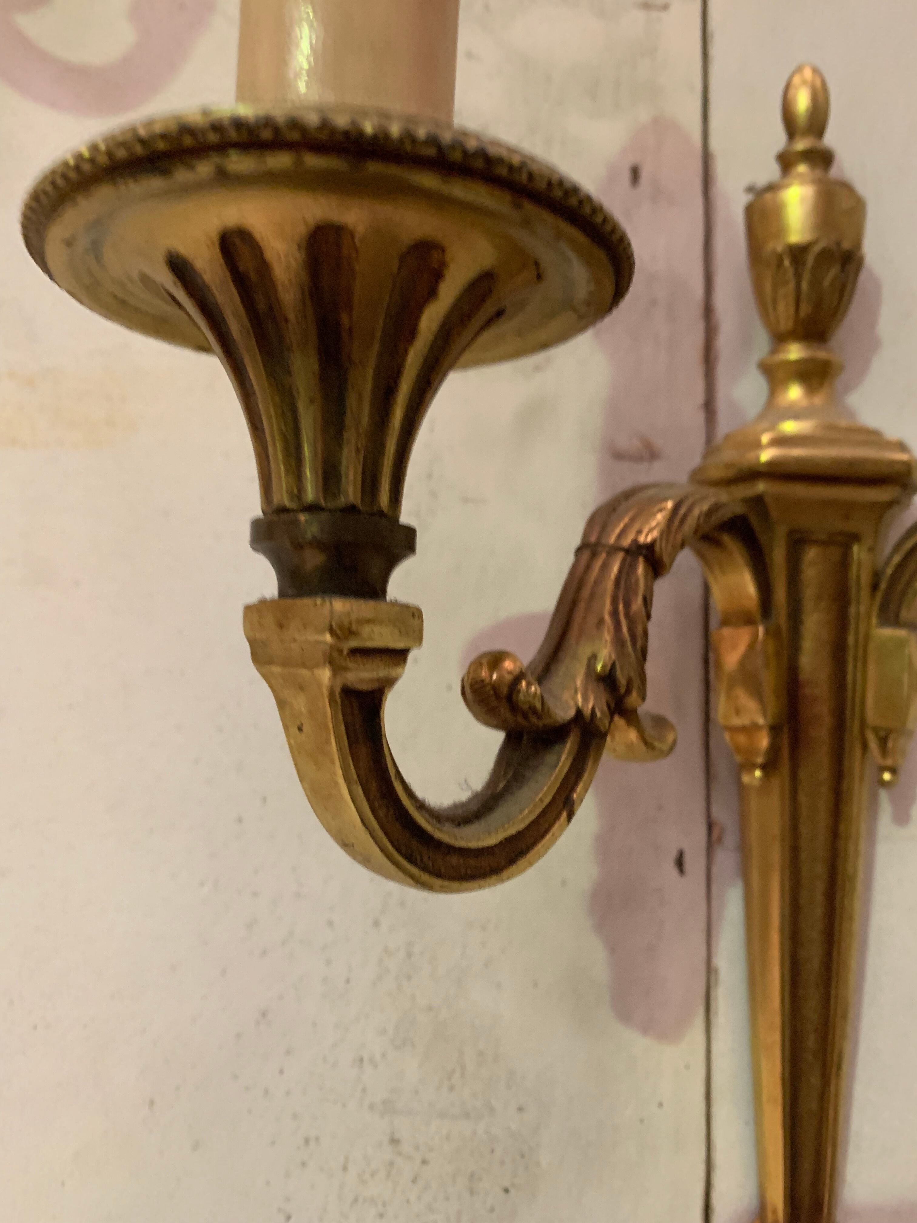 Pair of Louis XV style sconces in gilded bronze XX century