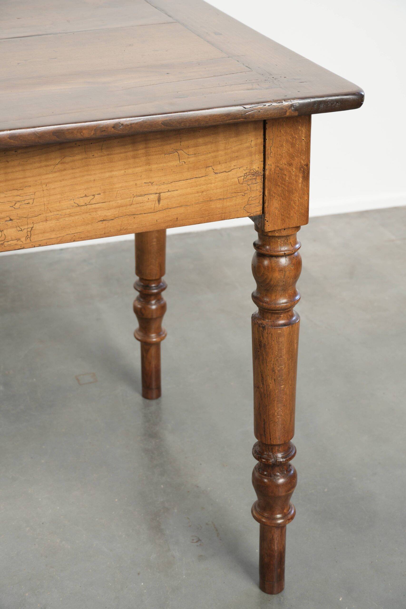 Antique French cherry wood dining table from the 19th century