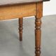 Antique French cherry wood dining table from the 19th century