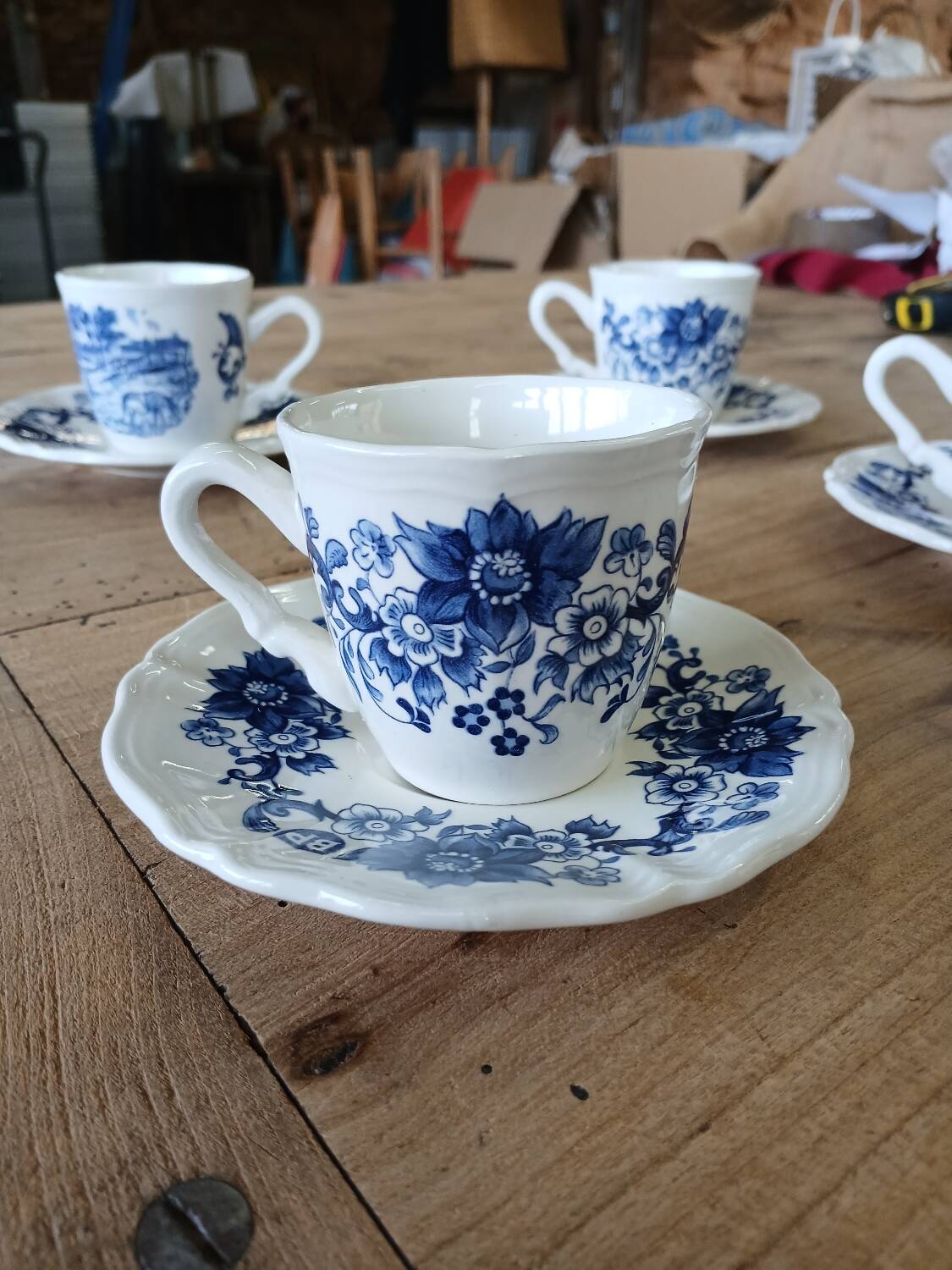 4 antique cups and saucers
