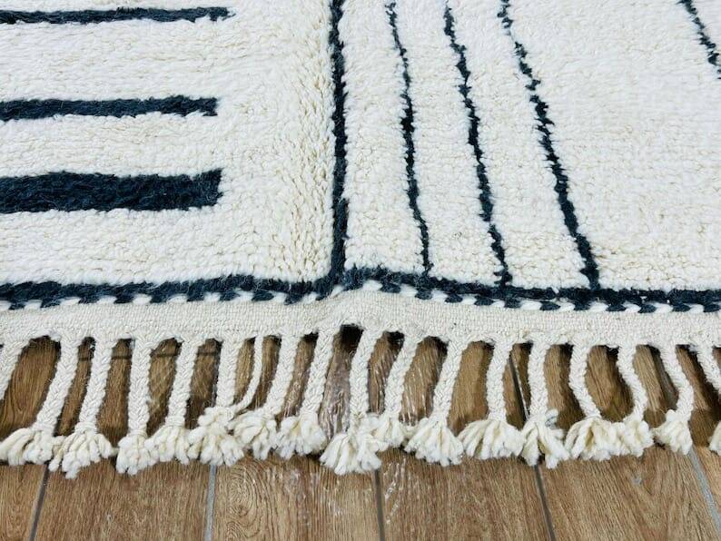 Handwoven natural wool Berber rug in black and white, 150/250 cm.