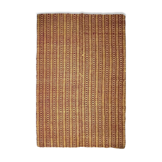 Romanian vintage carpet brown design on a yellow background
