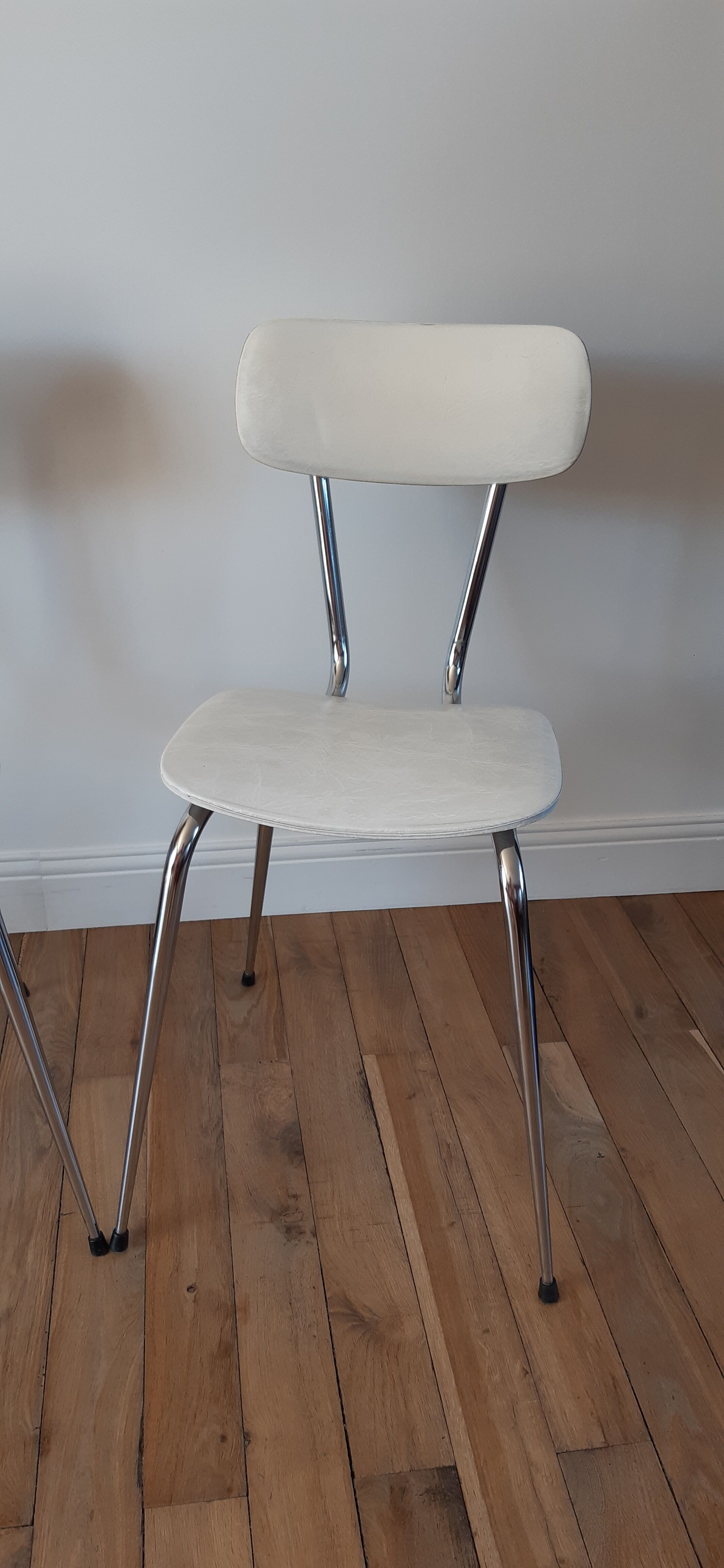 Duo of chairs in skaï, 60-70s