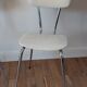 Duo of chairs in skaï, 60-70s