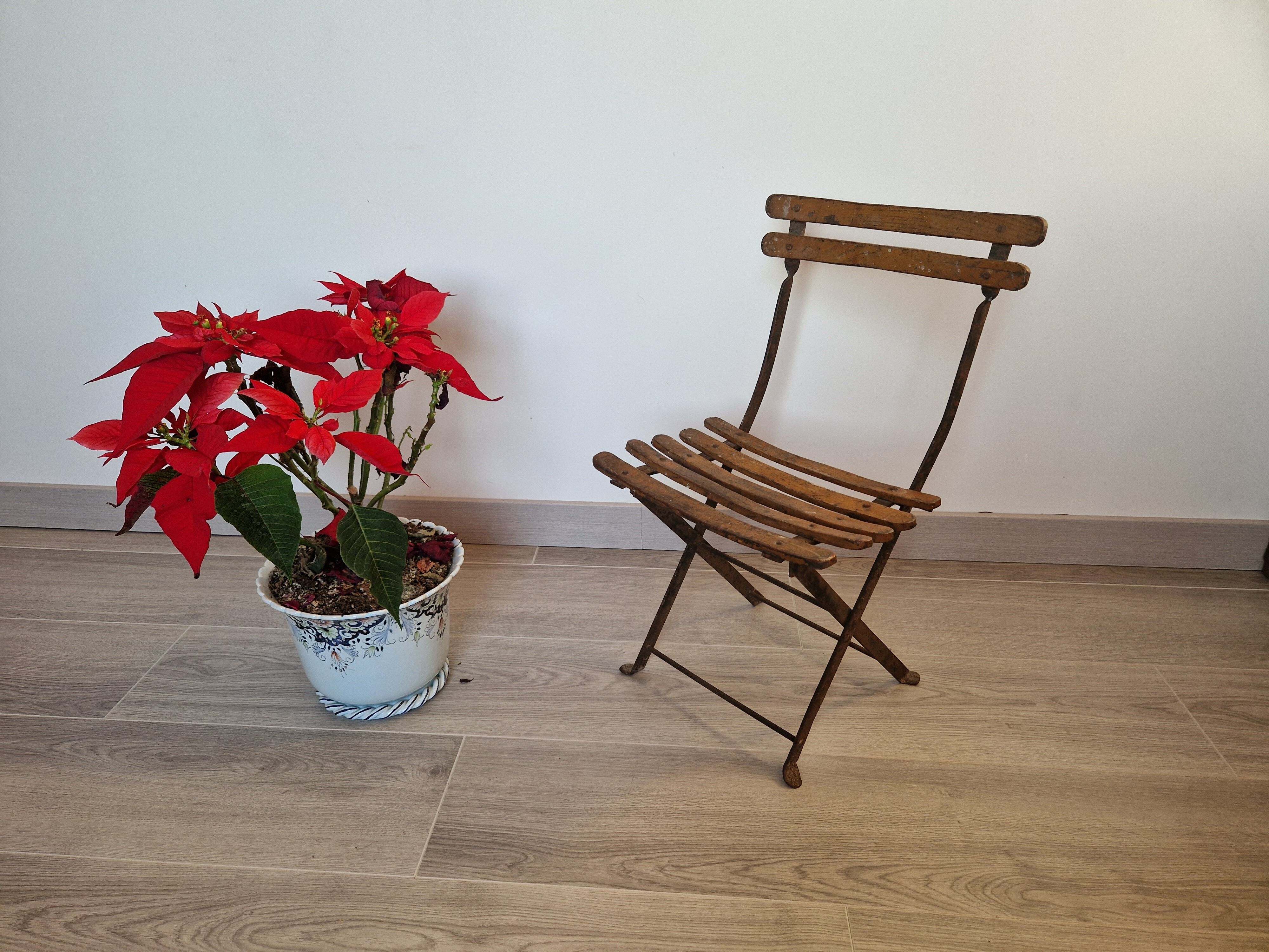 Old folding garden chair for children