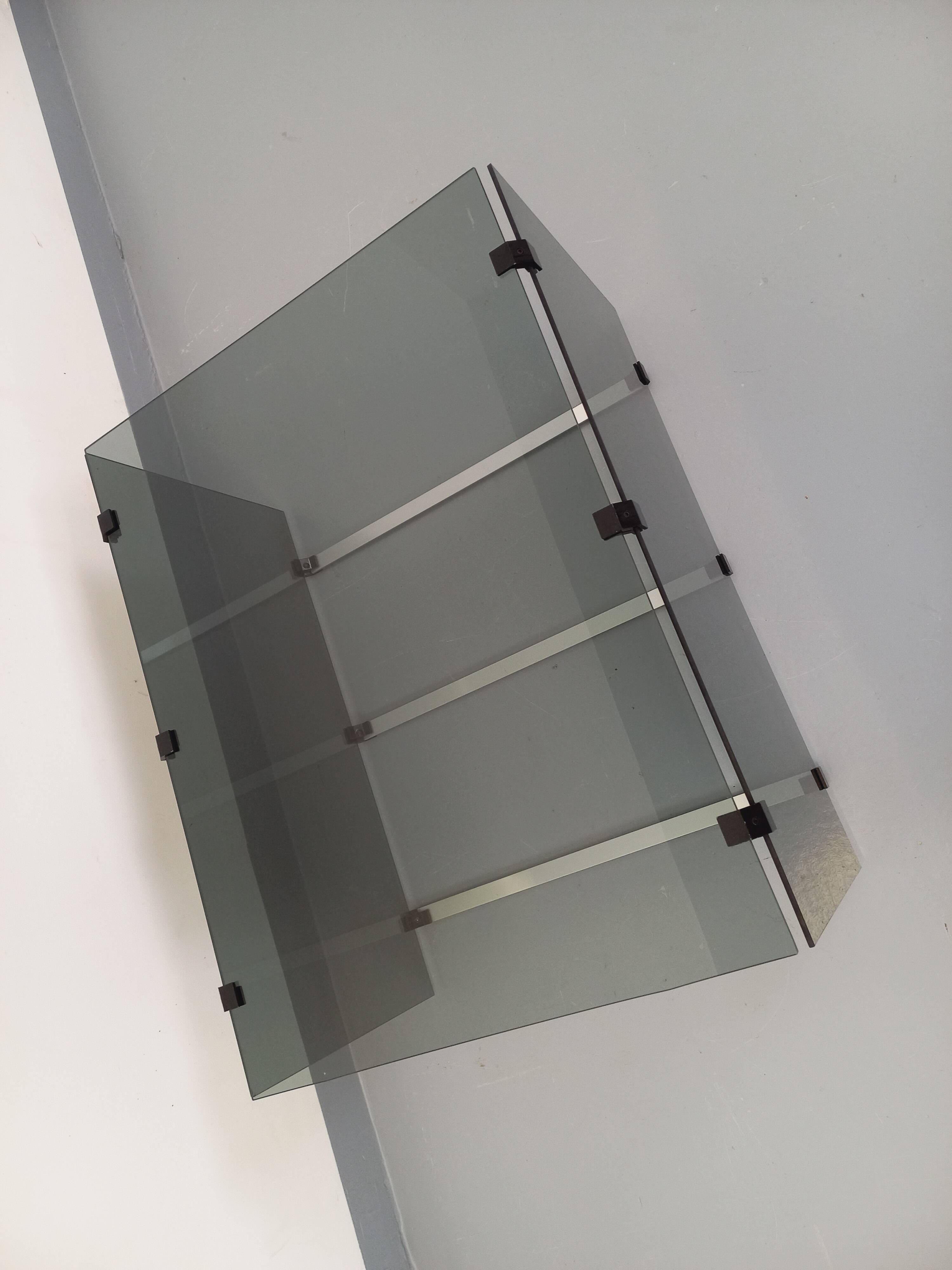 Vintage coffee table in smoked glass, black metal and cast aluminum