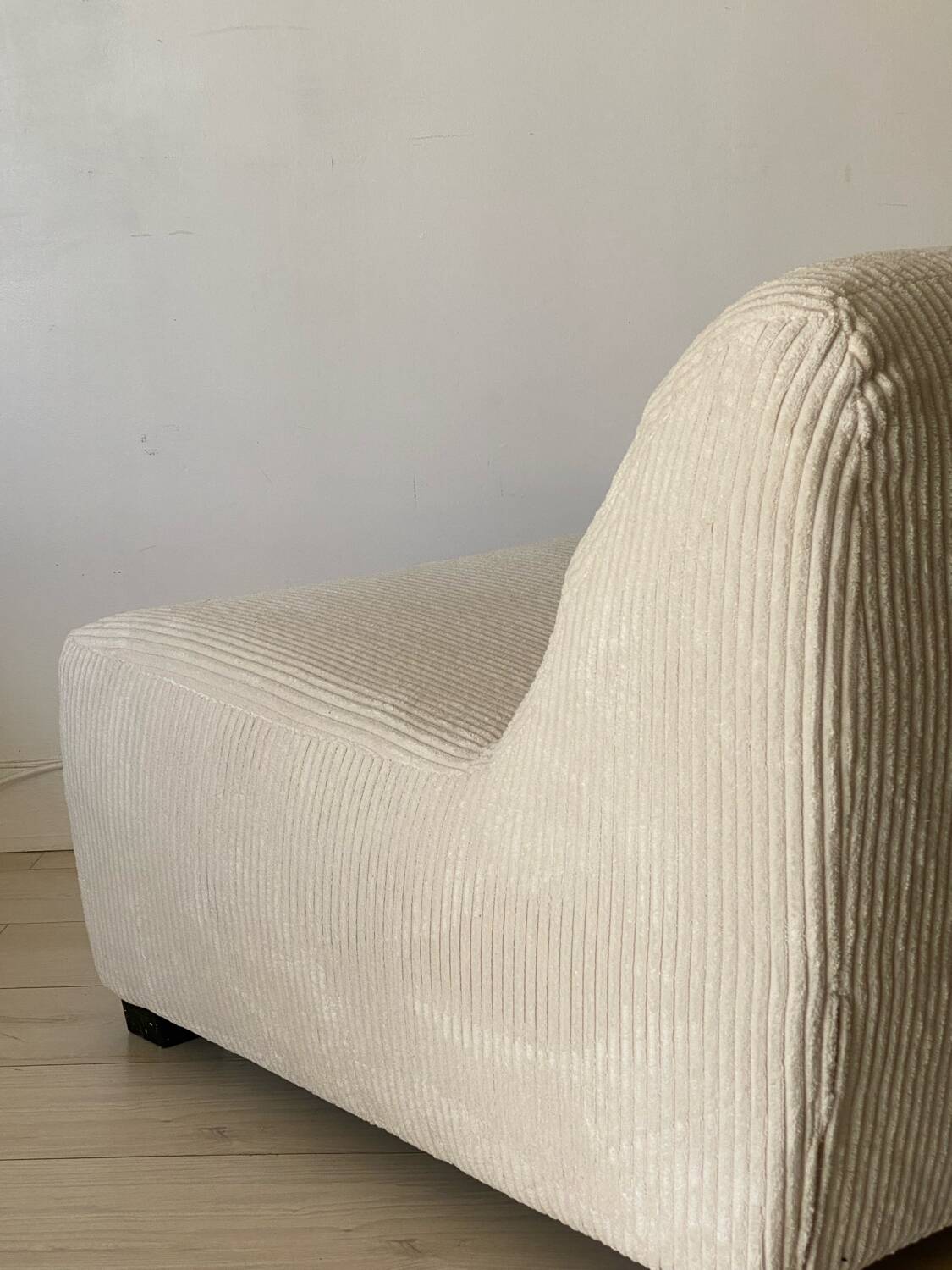 White corduroy armchair