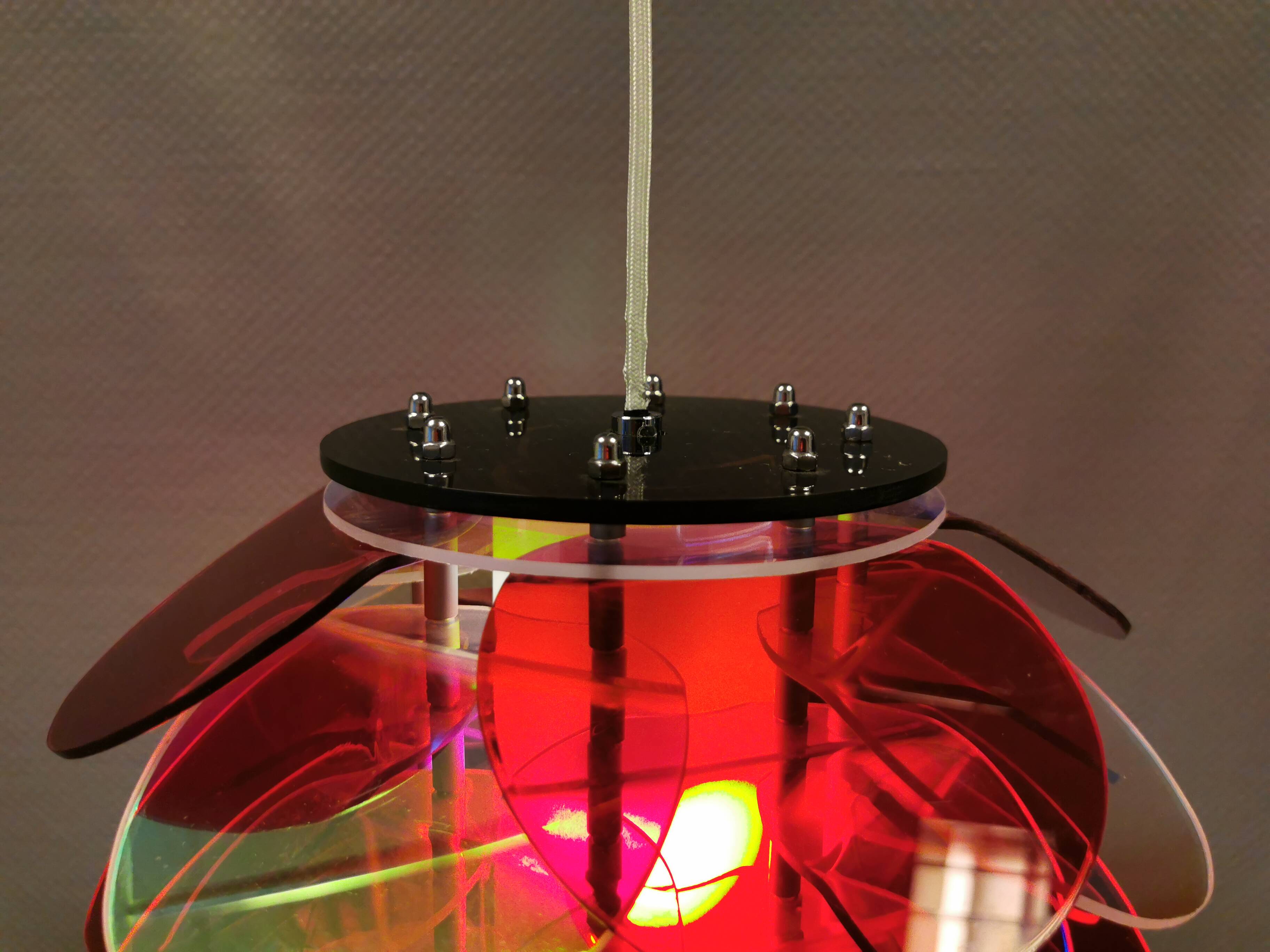 Danish Space Age hanging lamp made of plexiglass "leaves" with mirror reflex