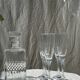 Set of 5 glass champagne flutes with twisted ribbed base