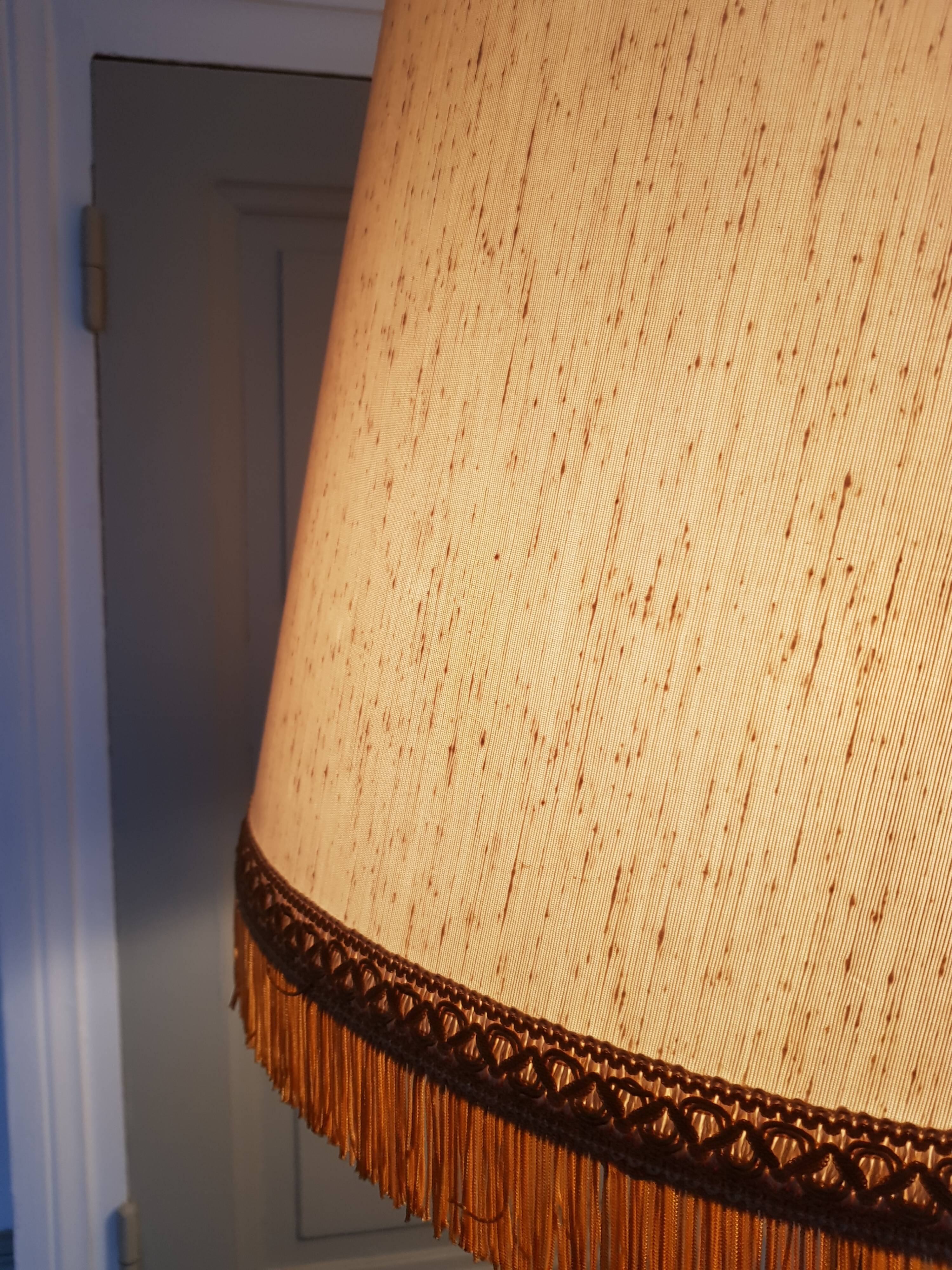 Authentic antique lamppost in gilded brass lampshade in fringed cream fabric