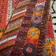 Hand woven flat woven Iraqi artisan rug.