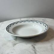 Set of 12 deep plates Saint Amand with floral garland decoration.