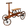 Old wooden child quadricycle tricycle