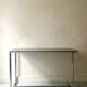 Dining table / tubular and modernist desk in chrome metal