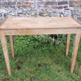 Old wooden farmhouse table with drawer