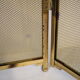 Vintage brass chimney firewall