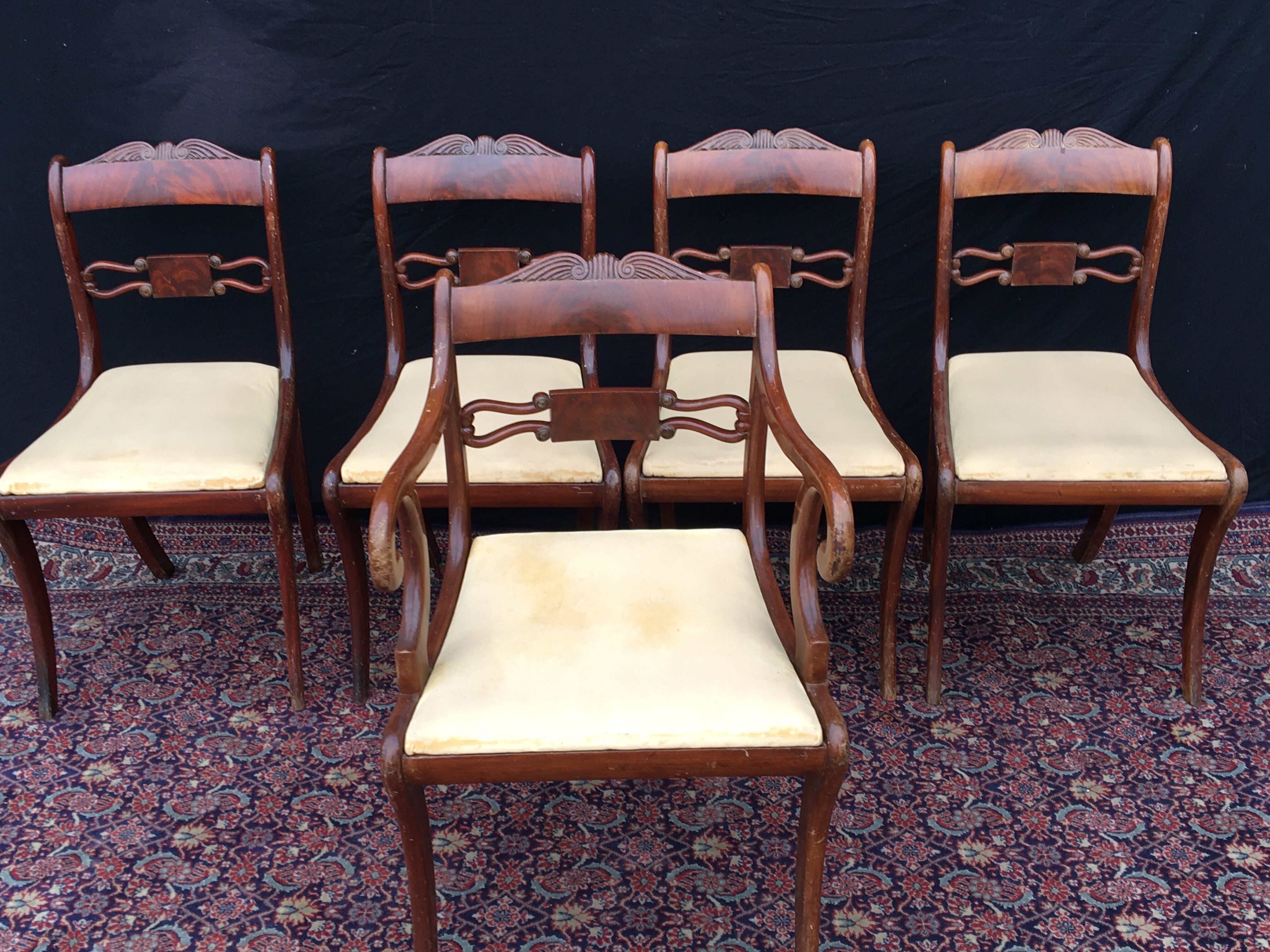 Set of 4 chairs and 1 armchair