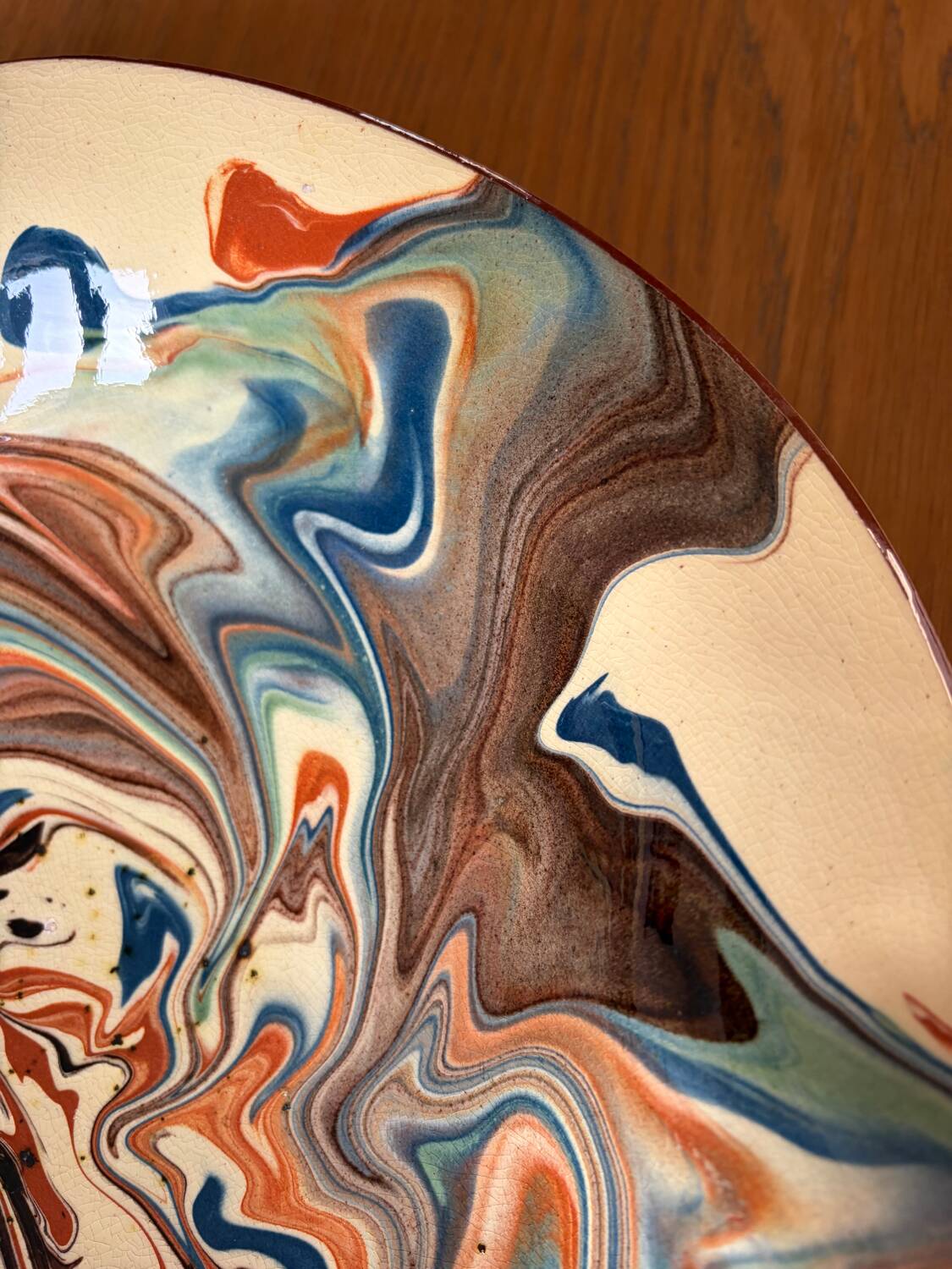 Glazed ceramic plate signed