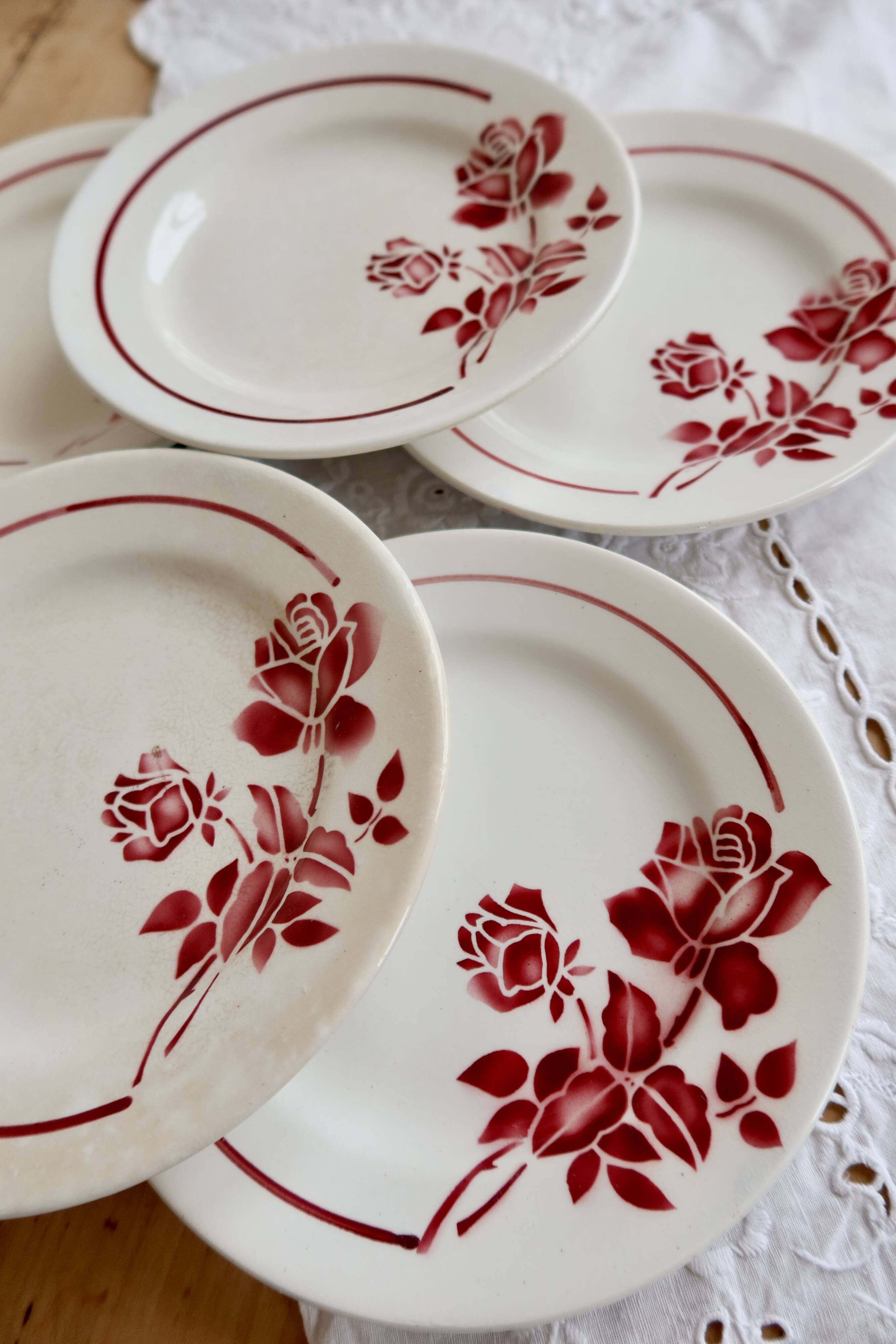 6 vintage dessert plates Moulin des Loups with burgundy floral decoration.