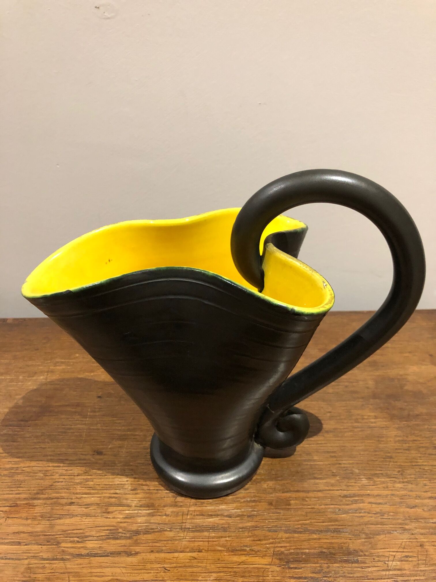 black and yellow vallauris pitcher