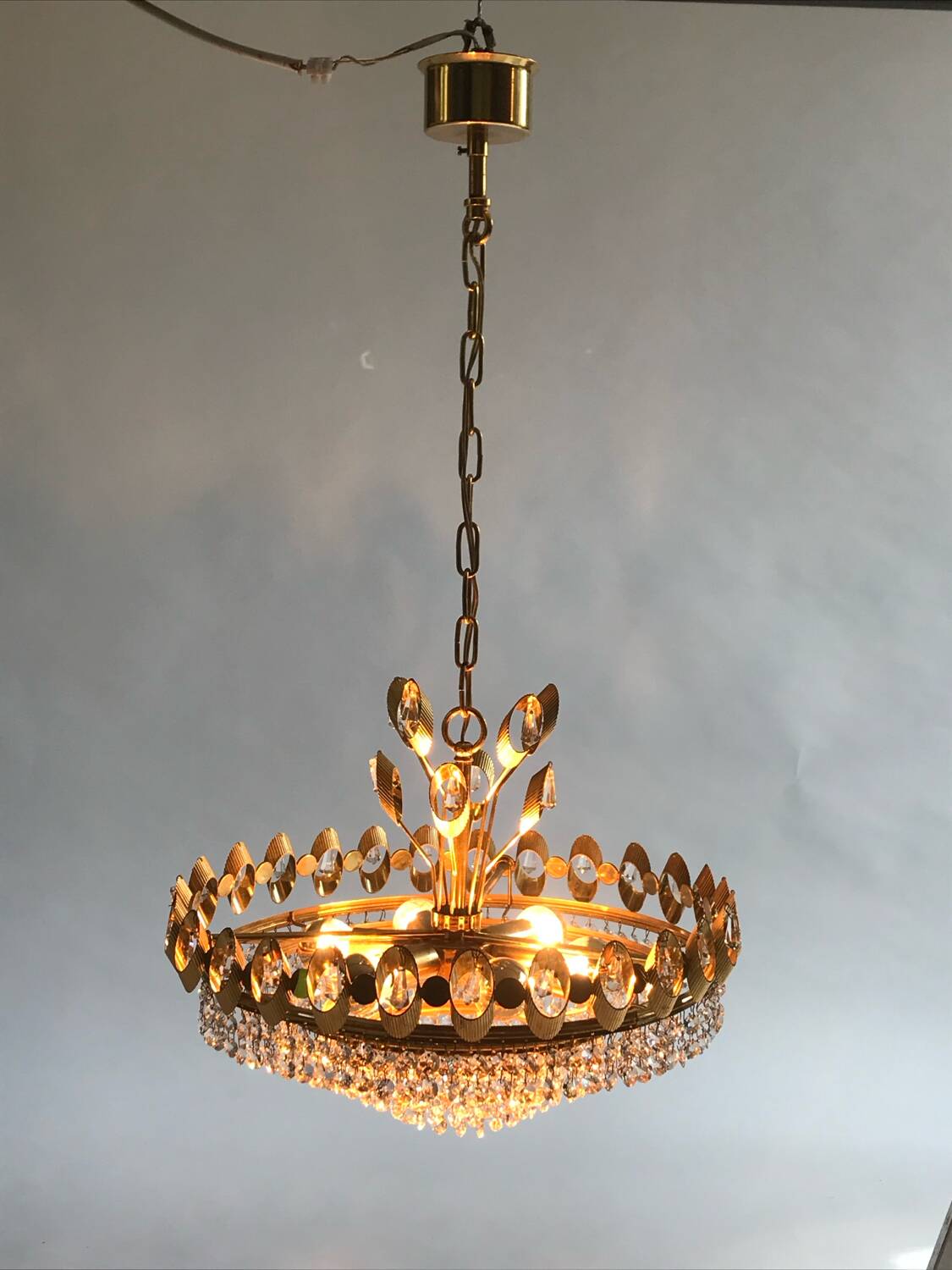 Hollywood Regency style brass and crystal chandelier by Palwa