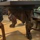 Octagonal oak table, 19th century, with griffins.