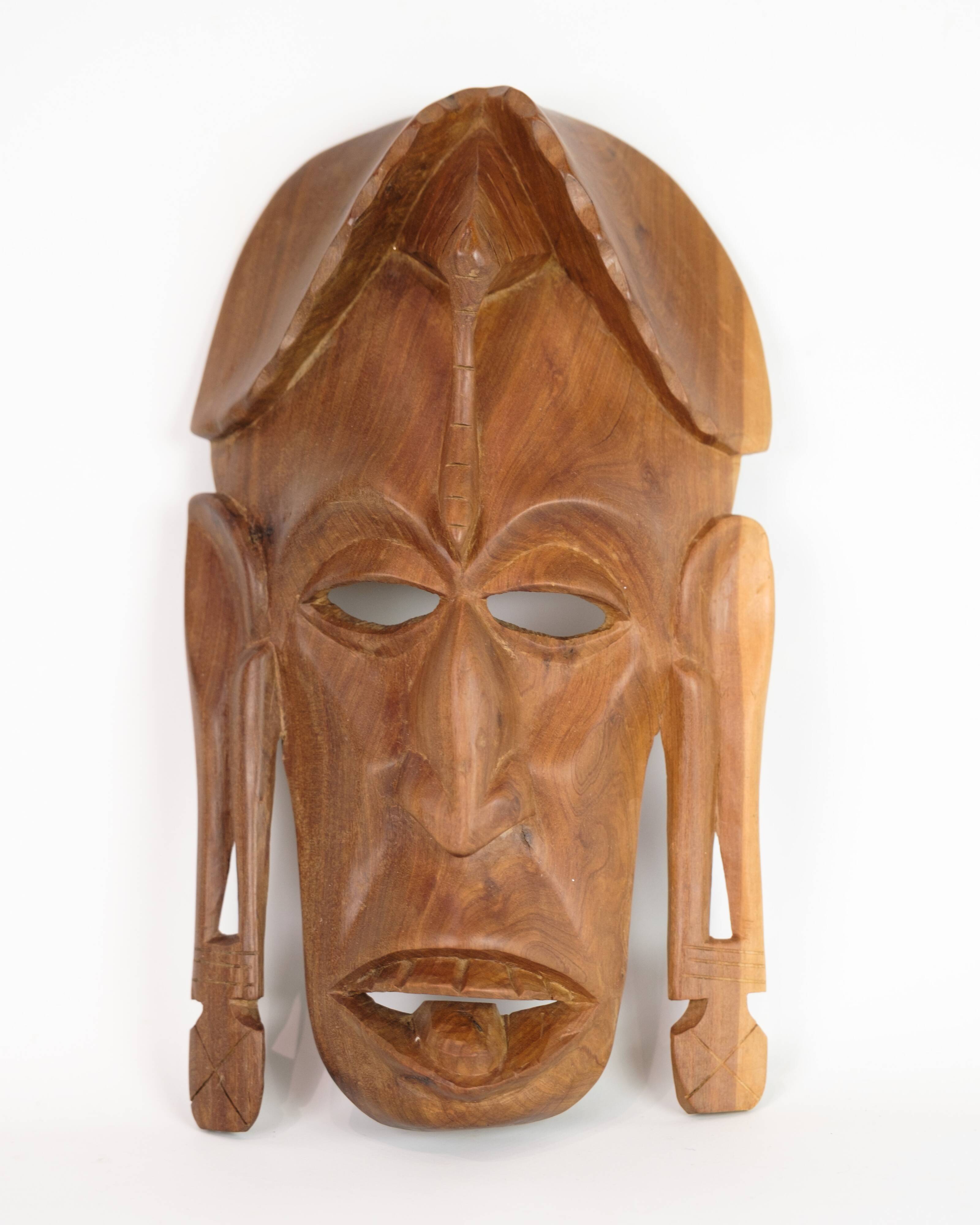 African Mask Hand Carved In Light Wood From West Africa