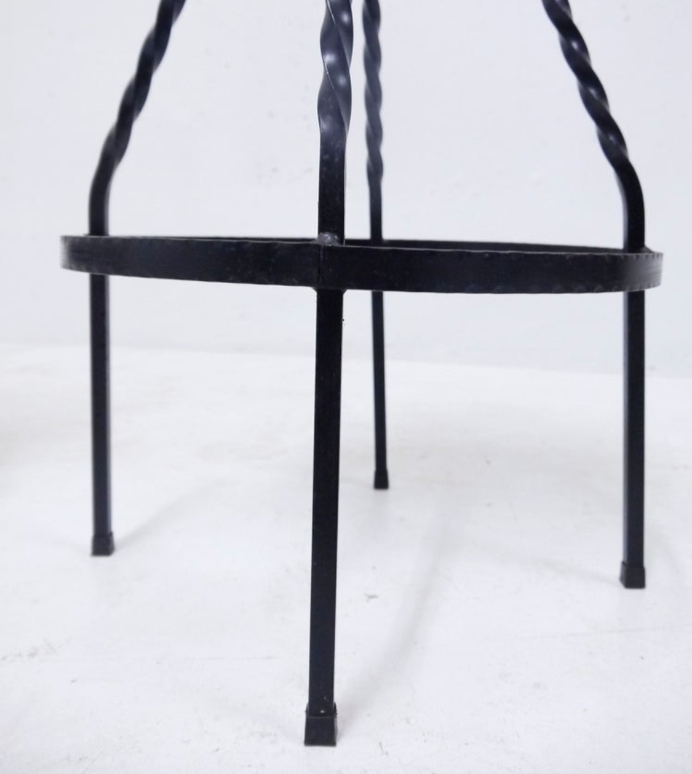 Footswith e.g. wrought iron feet and 60s vinyl seating