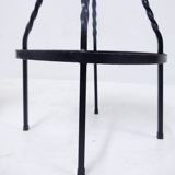 Footswith e.g. wrought iron feet and 60s vinyl seating